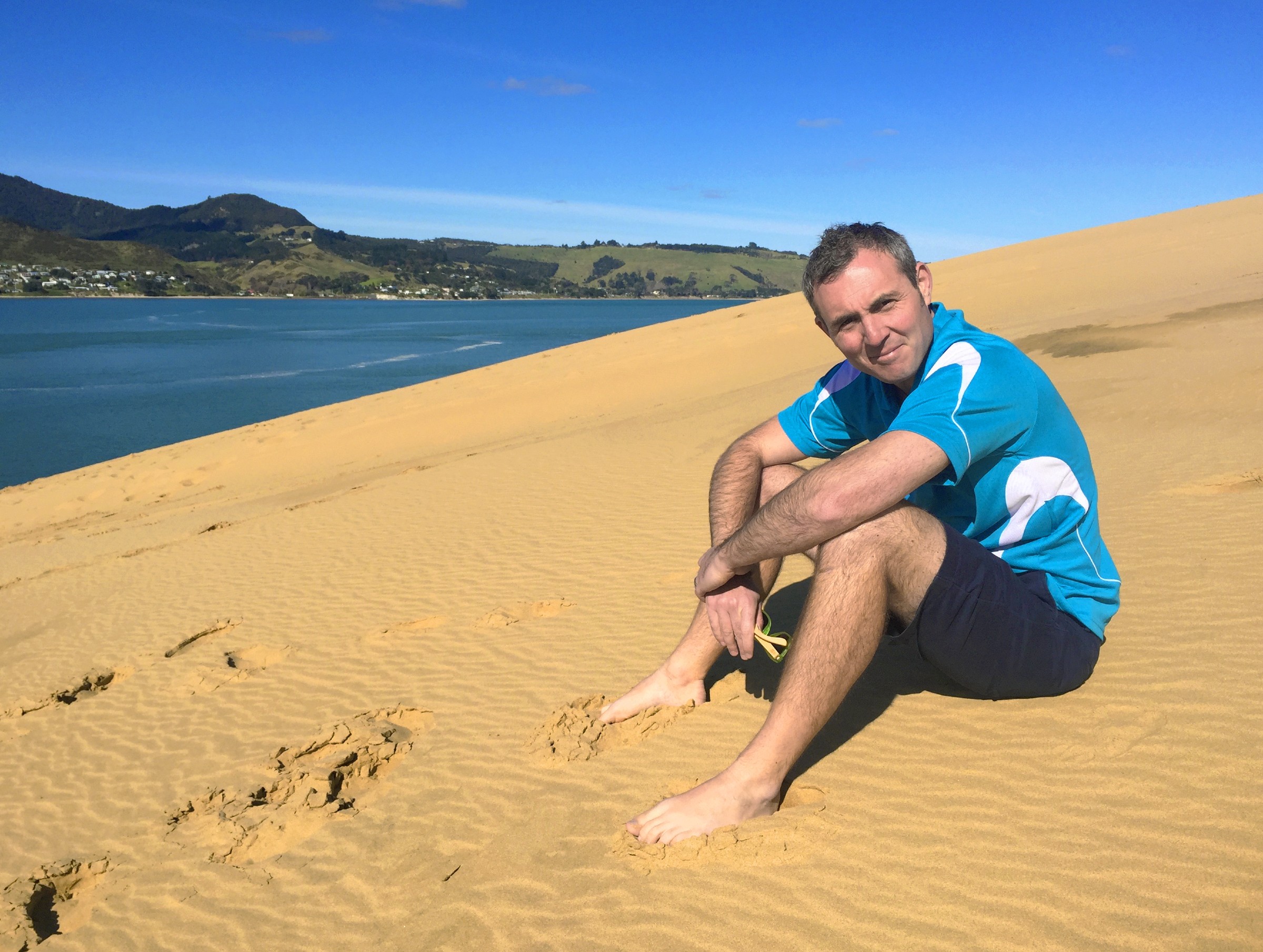 MoaTours guide Andrew on the sand dunes in the Hokianga harbour