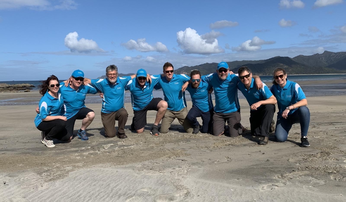 The MoaTours Team on the beach at Great Barrier Island