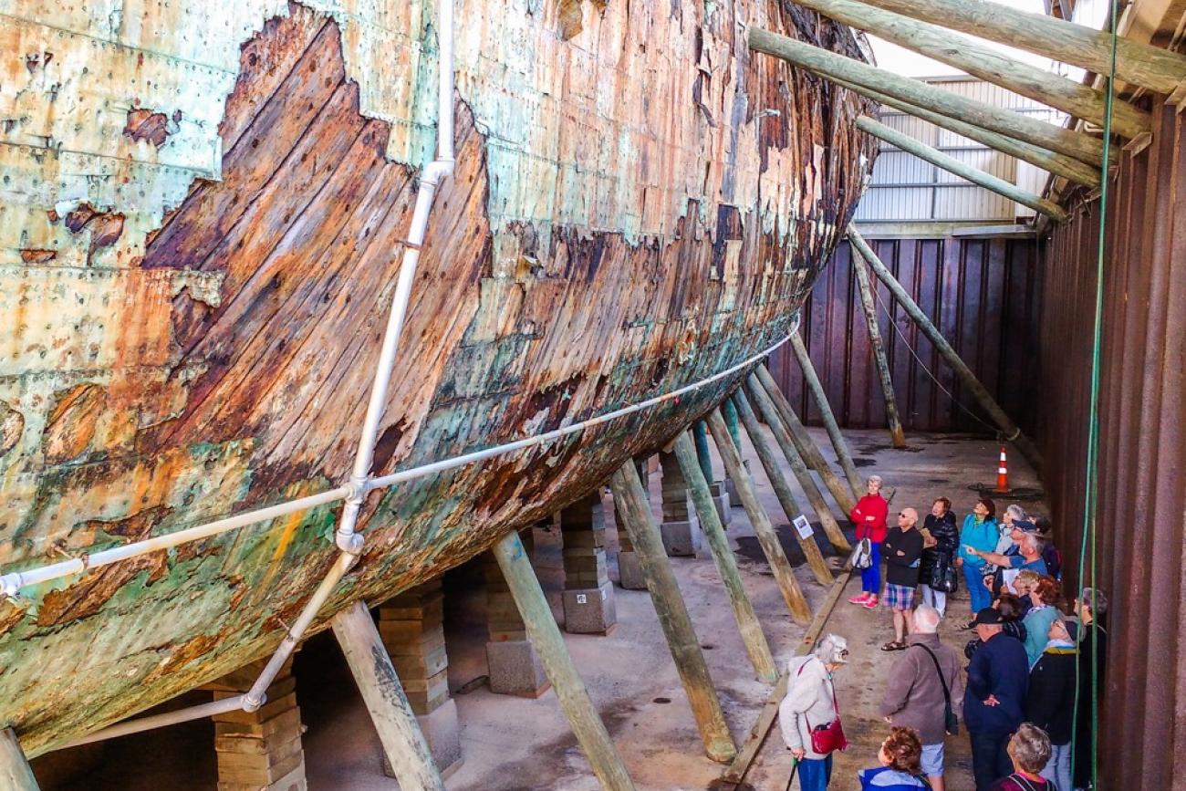 MoaTours guests discovering the secrets of the Edwin Fox Ship