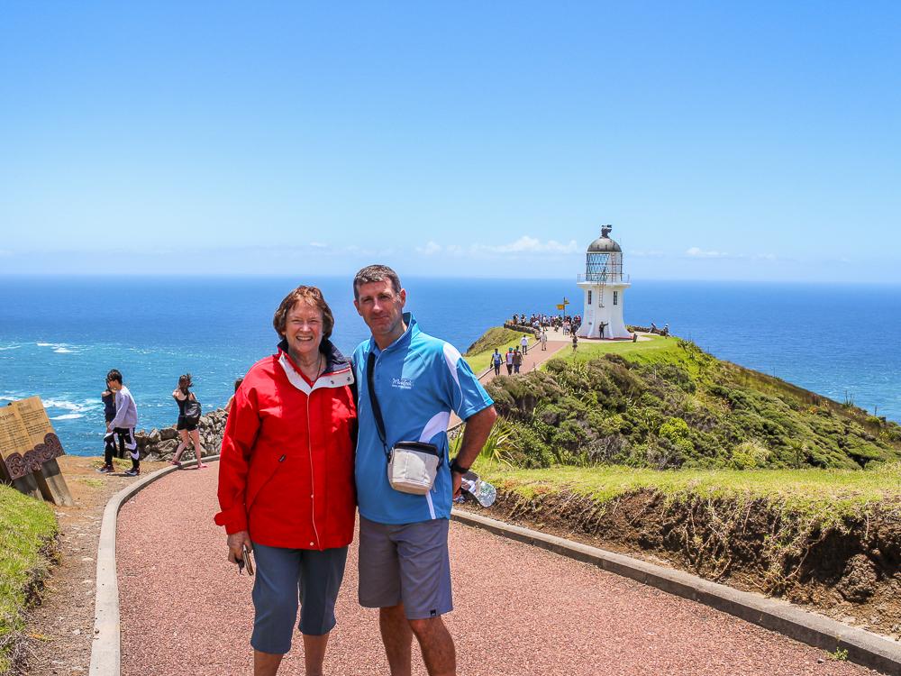 MoaTours Kiwi Guide and guest at the Cape Reinga lighthouse