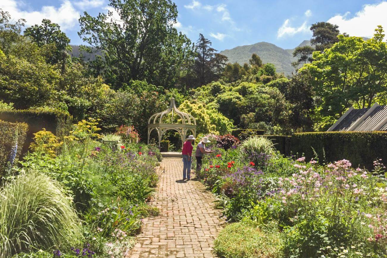 MoaTours Guests exploring Ohinetahi Gardens