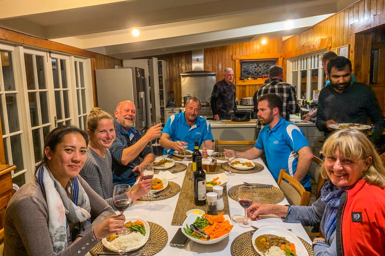 The MoaTours team enjoying dinner at Shoal Bay Lodge on Great Barrier Island