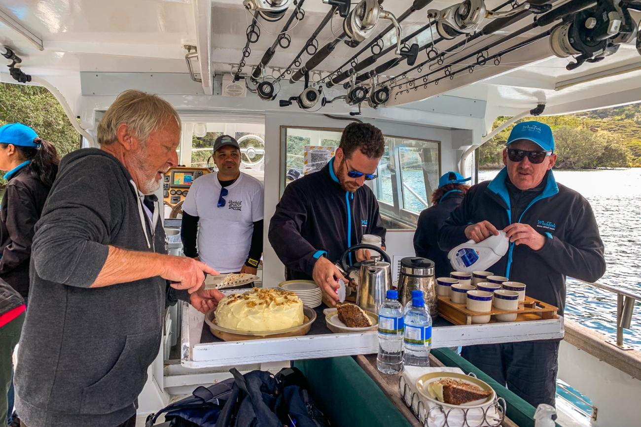 Coffee and cake with skipper Chris on Great Barrier Island