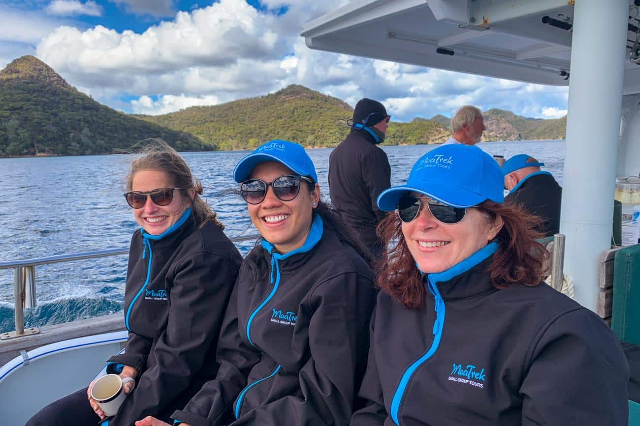 Imke, Nikita & Tracy from MoaTours enjoying a cruise on Great Barrier Island