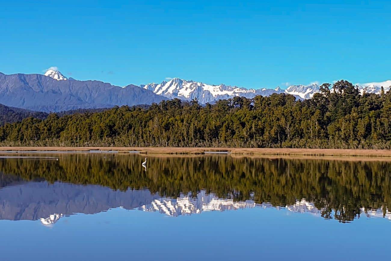 Kotoku & the Southern Alps on a perfect day at Okarito Lagoon