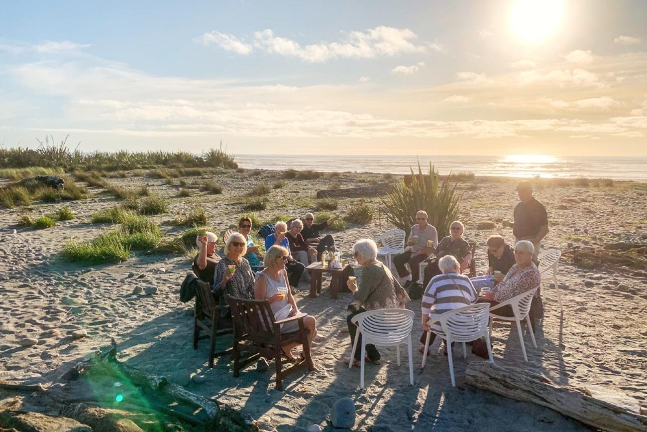 Enjoying a beach bonfire at Punakaiki