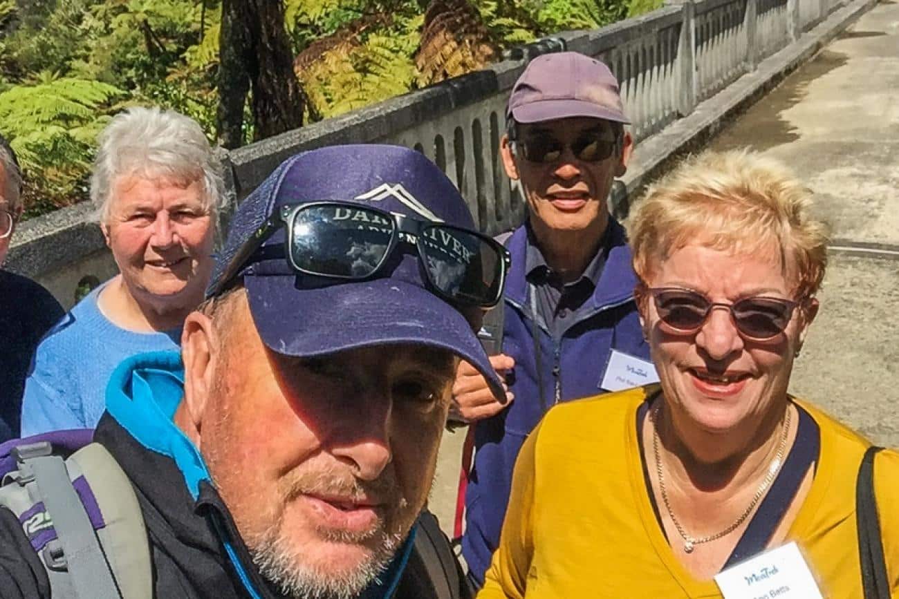 MoaTours guide Kiwi on the Bridge to Nowhere with guests