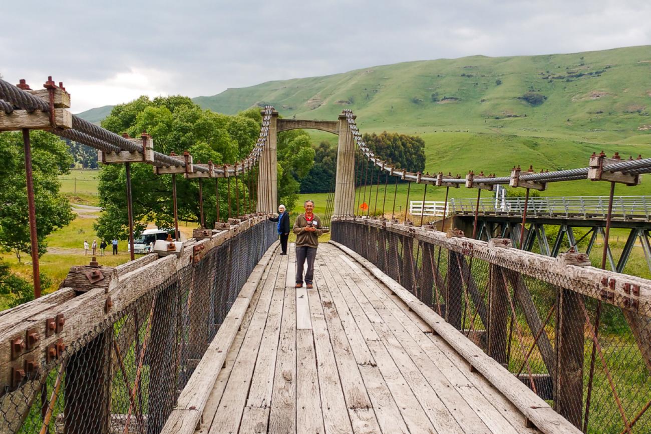 Walking across the Springvale suspension bridge on the Gentle Annie route