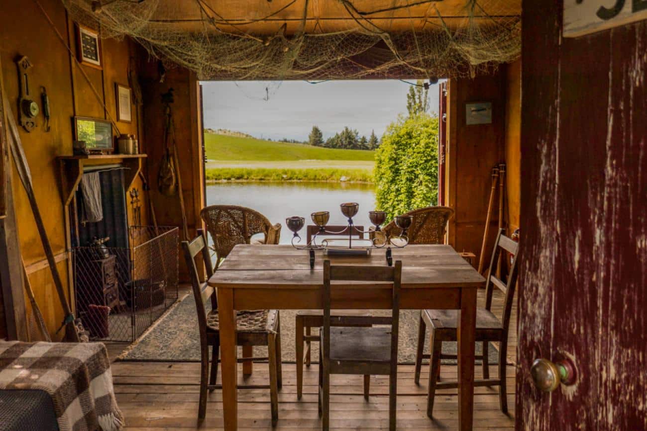 Rustic shed and views to the Pond at Clachanburn Gardens