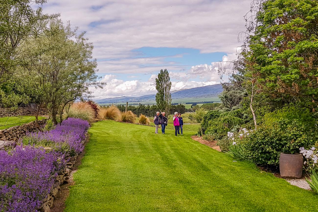 MoaTours guests walking Clachanburn Gardens in the Maniototo Valley