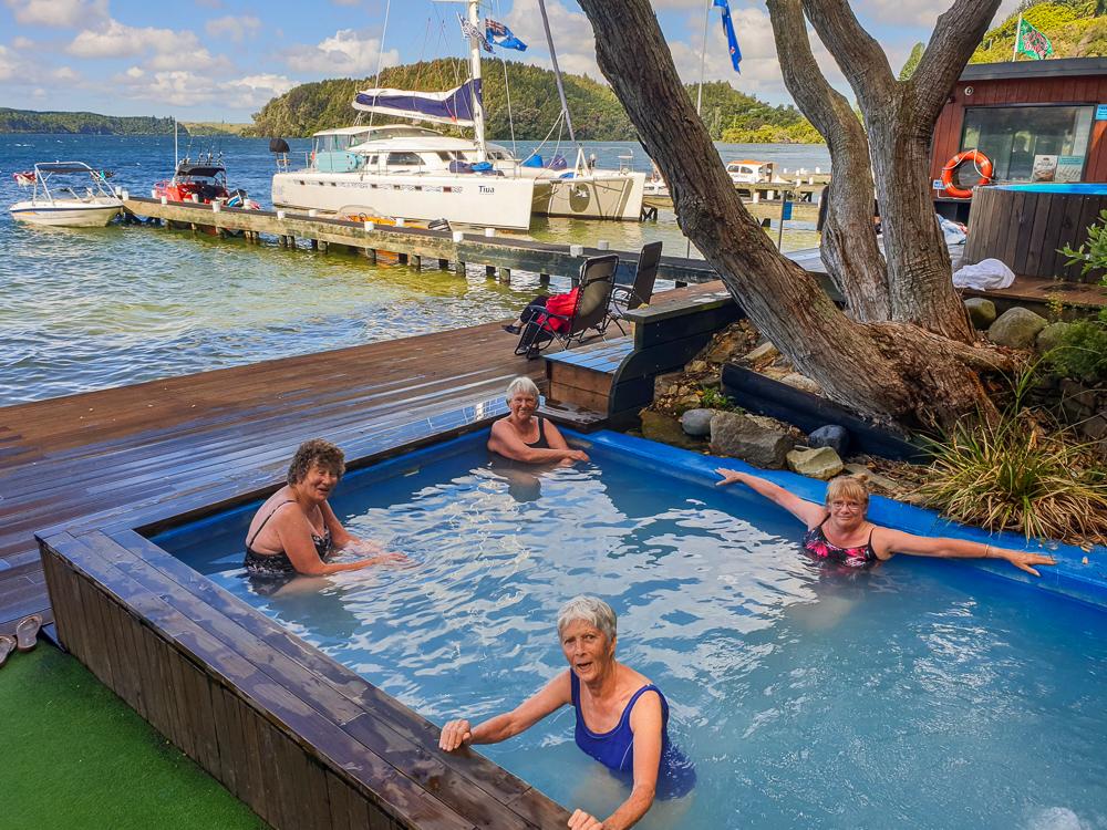 MoaTours guests enjoying a soak in the hot pools at Lake Rotoiti