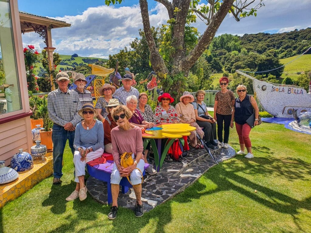 MoaTours guests dressed for summer at Giant's House Garden on Banks Peninsula