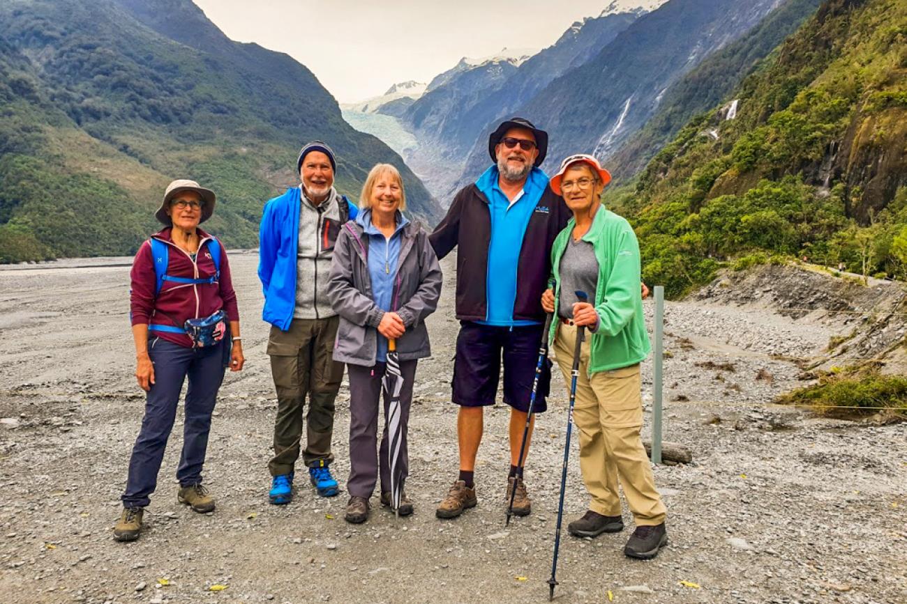 MoaTours guests and guide Tim walking in Franz Josef