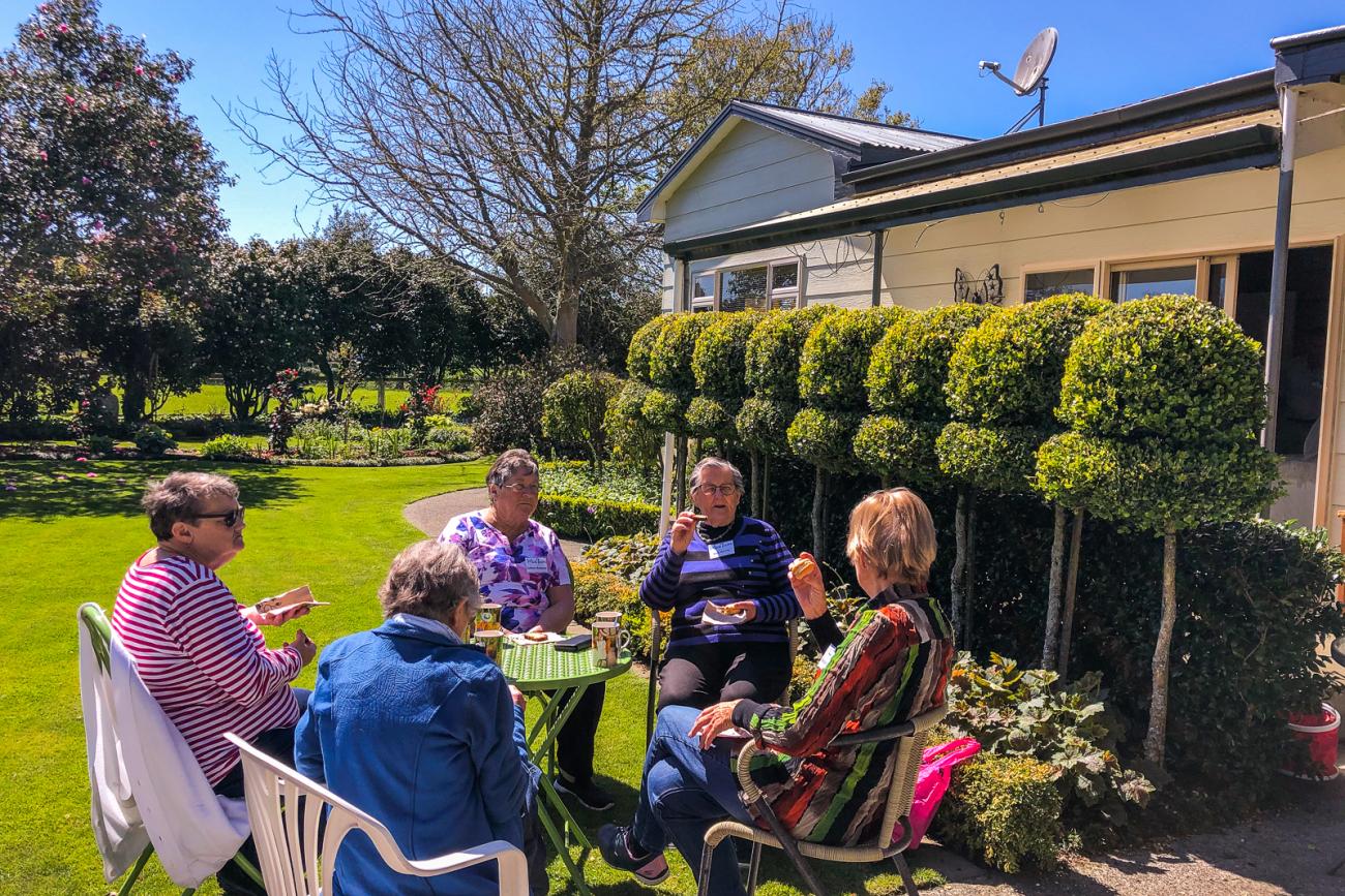 Enjoying morning tea at Cairnhill garden in Stratford