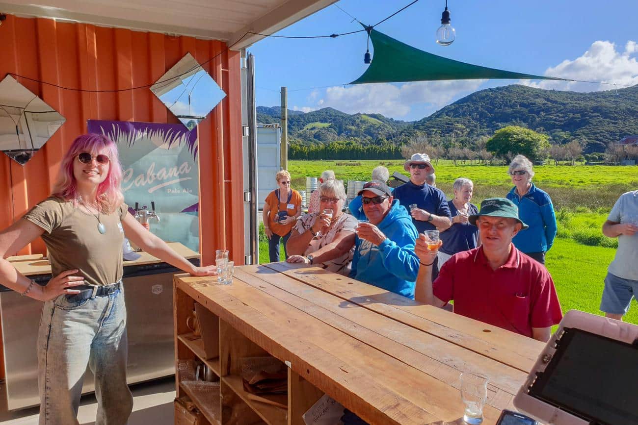 Trying the local brew on Aotea Great Barrier Island