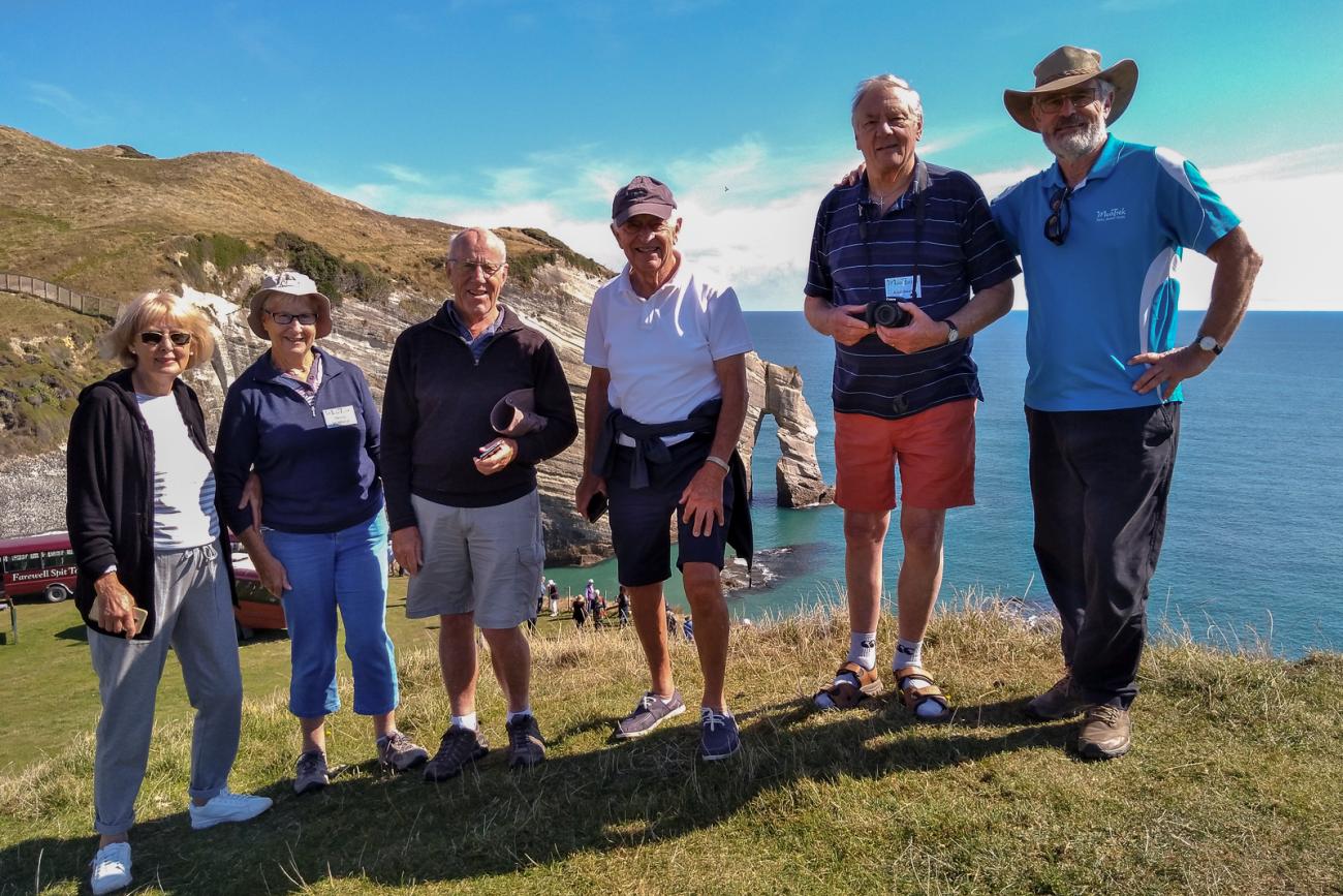 Kiwi Guide Graeme with guests at Cape Farewell